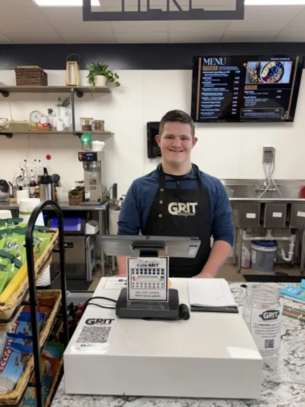 Cafe Grit barista at the Twin City Twisters location