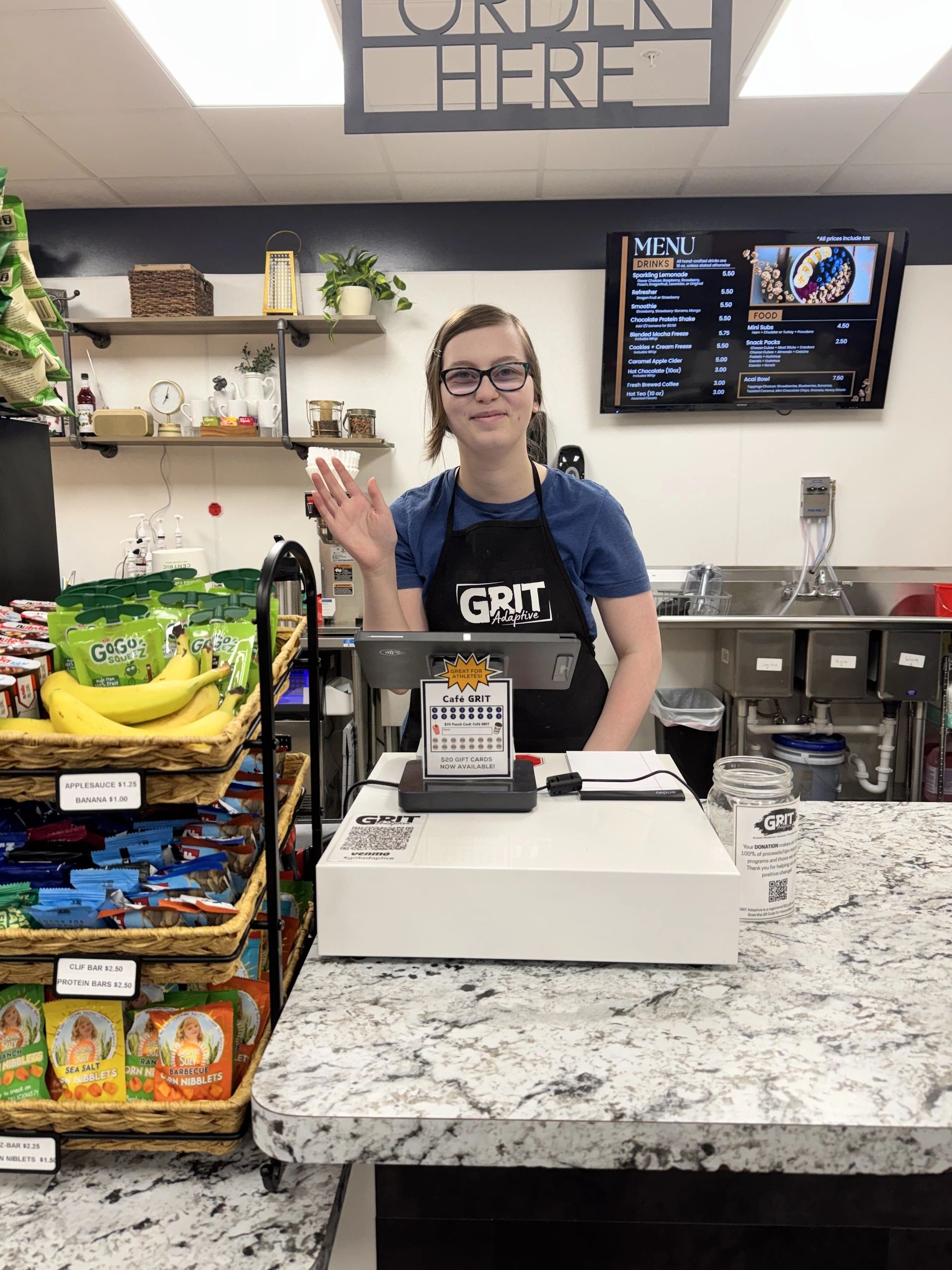Cafe Grit team member ready to serve